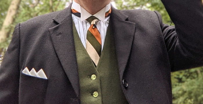 men wearing green waistcoat