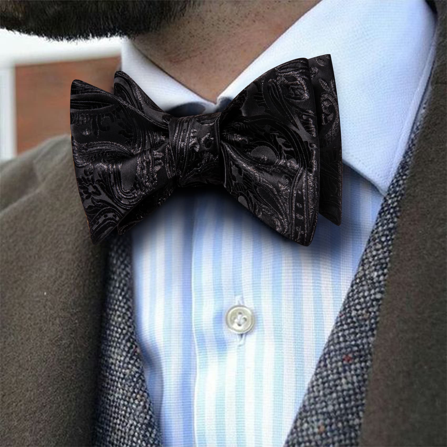 men in brown suit jacket and black paisley mens bow tie  bowtie tie