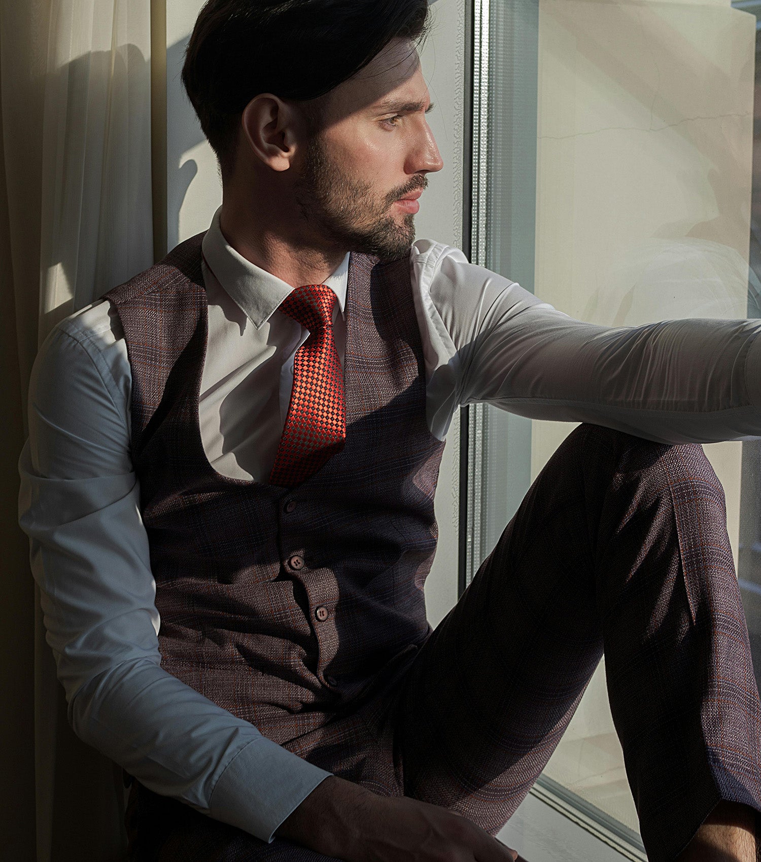 mens grey vest and red necktie